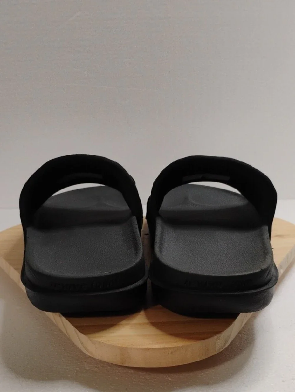 Nike Black Slide Sandals with Embossed NIKE Strap